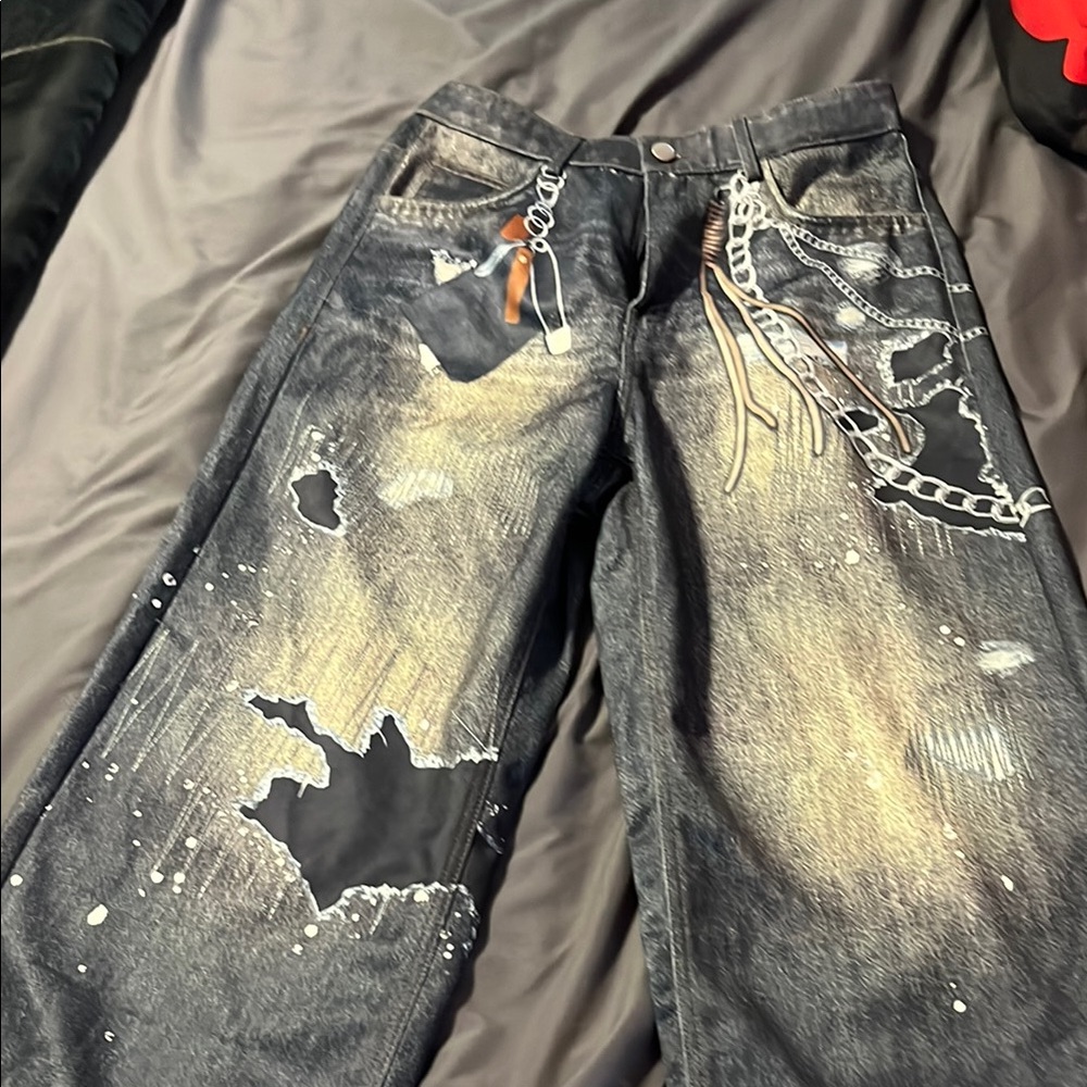 Distressed Blue Jeans with Chain Detail